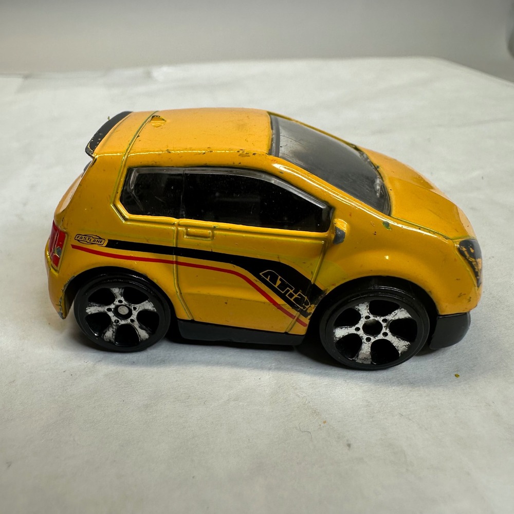 Fast Lane Yellow AT-002 Sport Hatchback Die-Cast Toy Car 2013 Racing Stripes